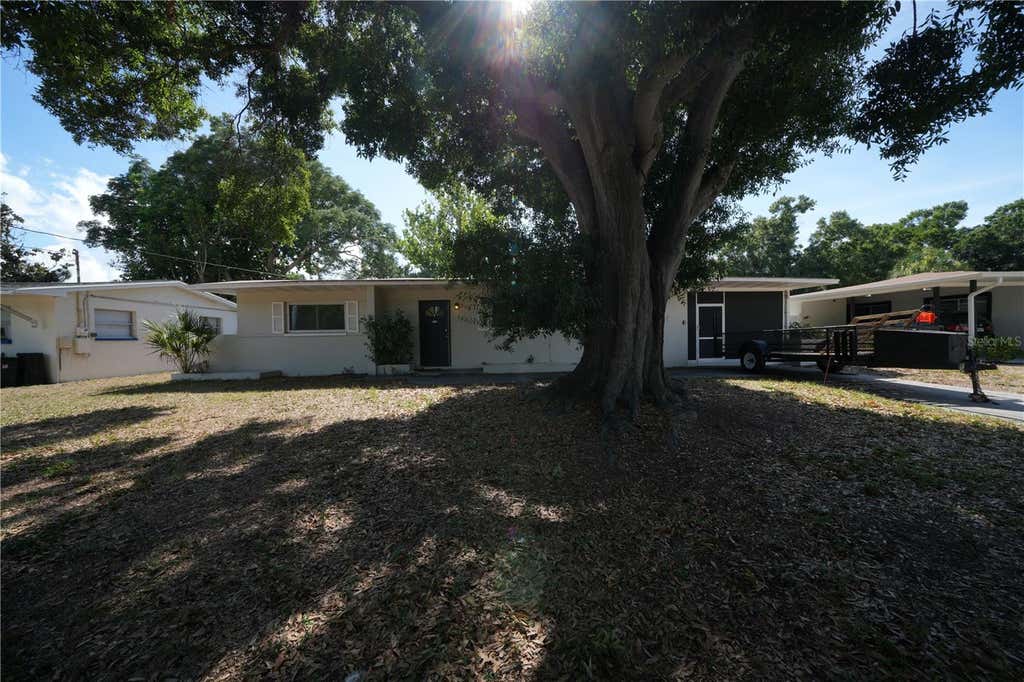 Photo of 4517 S Clark Avenue, Tampa, FL 33611 (MLS # O6423554)