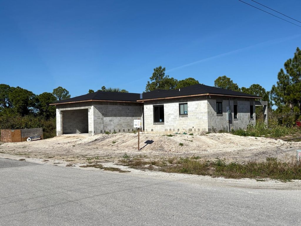 Photo of 2917 22nd Street W, Lehigh Acres, FL 33971 (MLS # O6372188)