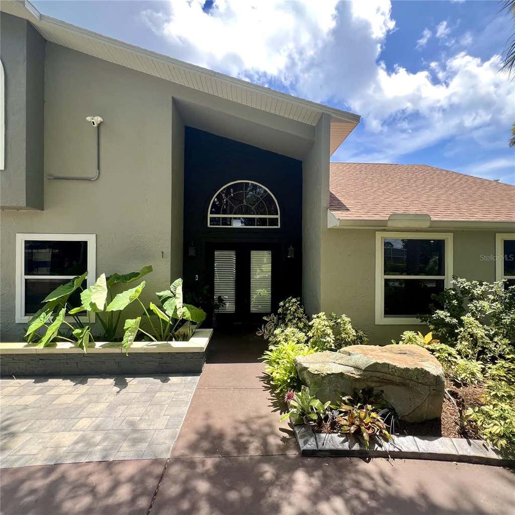 Photo of 1 Harris Circle, Edgewater, FL 32141 (MLS # NS1088870)