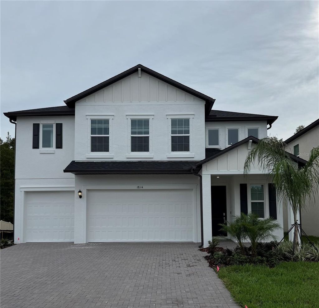 Photo of 18114 Serene Lake Loop, Lutz, FL 33548 (MLS # J993158)