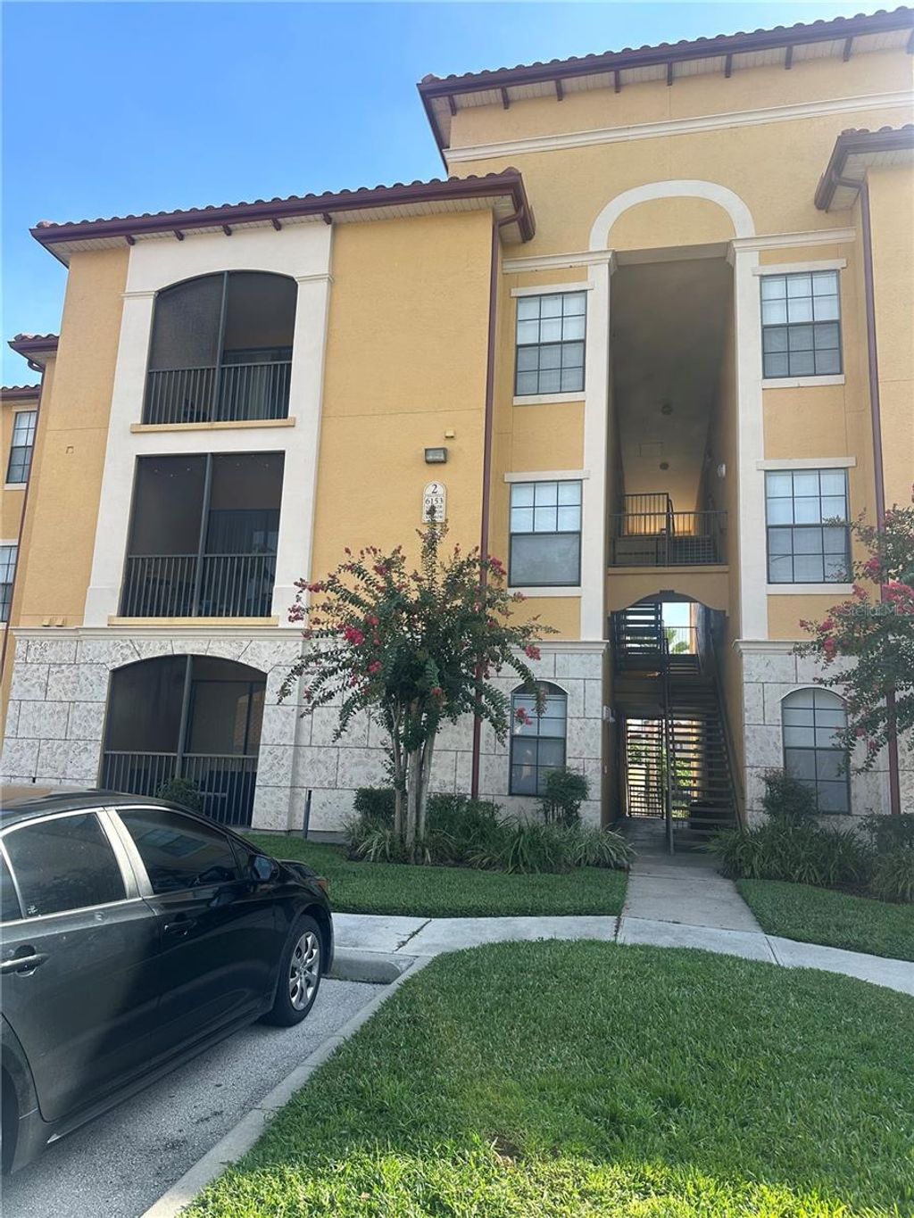 Photo of 6153 Metrowest Boulevard #205, Orlando, FL 32835 (MLS # O6366036)