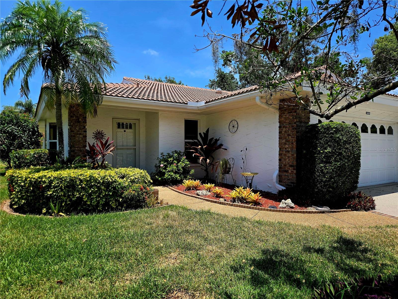 Garden Lakes Villa's is gated, 55 +, socially active, gated community, just off SR-70. This lovely property has mature landscaping and large lakes with wide, winding roads. This villa that has an open floor plan with natural light streaming in thru sky lights. Home features include two bedrooms, two bathrooms, enclosed lanai, large eat in kitchen and oversized two car garage for additional storage . If you are looking for an active lifestyle, this could be the community for you. Amenity includes a clubhouse with social room and catering kitchen, card room, library, an active calendar of planned events and clubs, large heated pool, gym, tennis, pickle ball, and the walking paths. This community is conveniently located close to shopping, downtown Sarasota, and World-famous Beaches. First, last and security required for move in.