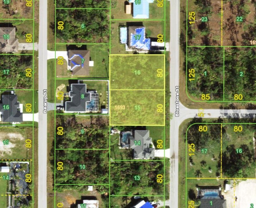 2 Lots! 5397 & 5305 Bluestone. Don't miss this opportunity to own two side by side parcels sold together — totaling 0.46 acres (160' wide x 125' deep) of naturally wooded land and on City Water, in one of Southwest Florida's fastest-growing communities! Options abound split into two individual 80' x 125' lots and build on one while selling the other, construct two side-by-side residences, or keep the full double lot for your dream home with plenty of room for your boat, extra garage or guest house. Best of all — NOT in Scrub Jay protected area! Surrounded by tons of homes and new construction, this prime Port Charlotte location offers peaceful, wooded surroundings with quick access to downtown, major highways, shopping, dining, boating, and golf. Charlotte Harbor — renowned for world-class fishing and boating — is just minutes away. When it's time to hit the beach, you're only a short drive from some of Southwest Florida's finest — Englewood, Boca Grande, and Venice Beaches. Whether you're looking to build your forever home, create an investment, or secure your own little slice of Florida paradise, this versatile double lot checks every box. Lots like this don't last — act now!