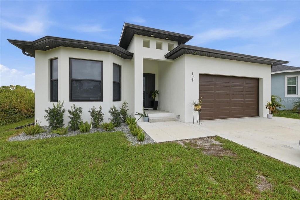 Photo of 137 David Boulevard, Rotonda West, FL 33947 (MLS # A4709932)