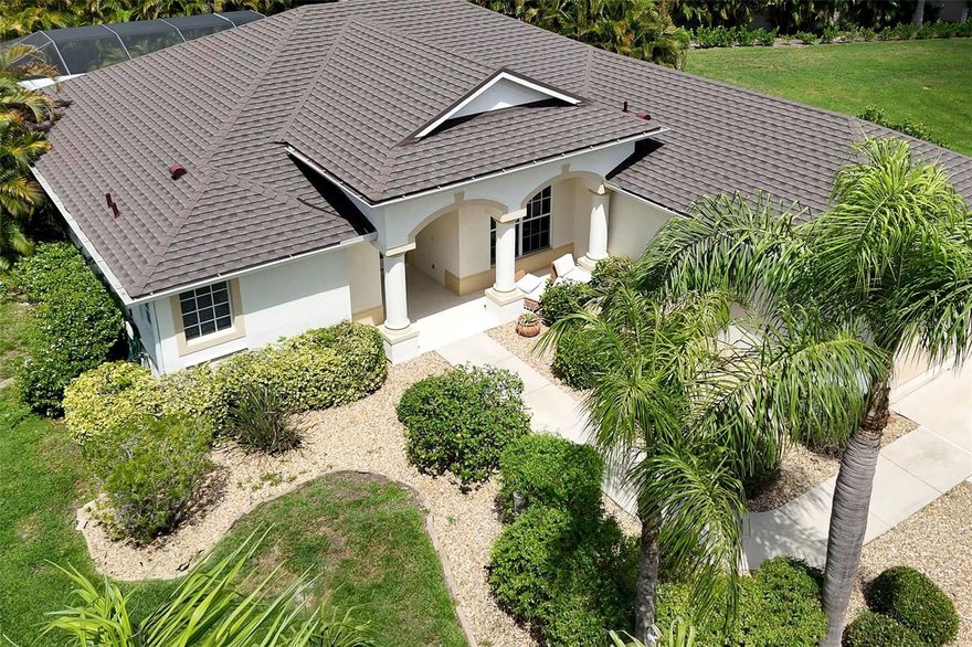 Experience the best of the Florida lifestyle in the gated community of Stillwater — a peaceful, beautifully maintained neighborhood known for its oversized homesites, privacy, sidewalks, and convenient location near everything that makes Southwest Florida so desirable. Residents enjoy the comfort of a smaller, upscale gated community atmosphere while being just minutes from Gulf beaches, championship golf, shopping, dining, medical facilities, and the nearby YMCA. -This gated community continues to be highly sought after for it’s blend of security, low-traffic streets, and active Florida lifestyle appeal. SET on a beautifully landscaped 18,730 sq. ft. lot, this meticulously maintained tropical retreat offers 2,229 sq. ft. of thoughtfully designed living space with 3 bedrooms, 2 baths, a 2-car garage, and an inviting heated pool and lanai area designed for year-round enjoyment.  From the moment you ENTER, the open-concept floor plan welcomes you with soaring volume ceilings, abundant natural light, and oversized 8-foot sliding glass doors that seamlessly blend indoor and outdoor living. The spacious great room opens beautifully to the lanai and sparkling pool area, creating the ideal setting for entertaining guests or simply relaxing in your own private oasis. The KITCHEN is both stylish and functional, featuring abundant cabinetry, Corian countertops, enhanced tile backsplash, breakfast bar seating, pantry storage, a newer refrigerator, and a sunny breakfast nook overlooking the expansive backyard. Just off the kitchen is a convenient bonus pantry with built-in cabinetry —The FORMAL dining room and bright FORMAL living room add elegance and flexibility to the home’s design, while the expanded family room —  showcases impressive custom cabinetry that adds warmth, character, and timeless appeal. The spacious PRIMARY suite serves as a relaxing retreat with tray ceilings, two walk-in closets including one oversized walk-in, and a luxurious ensuite bath featuring dual vanities, a garden tub, and Roman shower. GUEST bedrooms offer comfort and privacy with soothing designer-inspired finishes throughout. STEP OUTSIDE and discover your own slice of paradise. The expansive screened lanai and HEATED POOL area are surrounded by lush tropical landscaping and an oversized backyard that offers Exceptional privacy — perfect for outdoor dining, entertaining, or simply soaking up the Florida sunshine. Additional highlights include;  NEW stone-coated steel roof with exceptional durability-transferable 50-year warranty; -whole-house Hurricane Shutters + Roll-down Shutters on 3 sliders; Spacious Laundry Room with utility sink and storage- Large private homesite with room to garden and enjoy outdoor living- Sidewalk-lined streets perfect for morning walks and evening strolls -Minutes to beaches, golf courses, dining, shopping, and medical facilities -This exceptional residence captures the essence of luxury Florida living -where tropical beauty, comfort, privacy, & community come together in one extraordinary home. Furniture is newer and available on separate Bill of Sale.