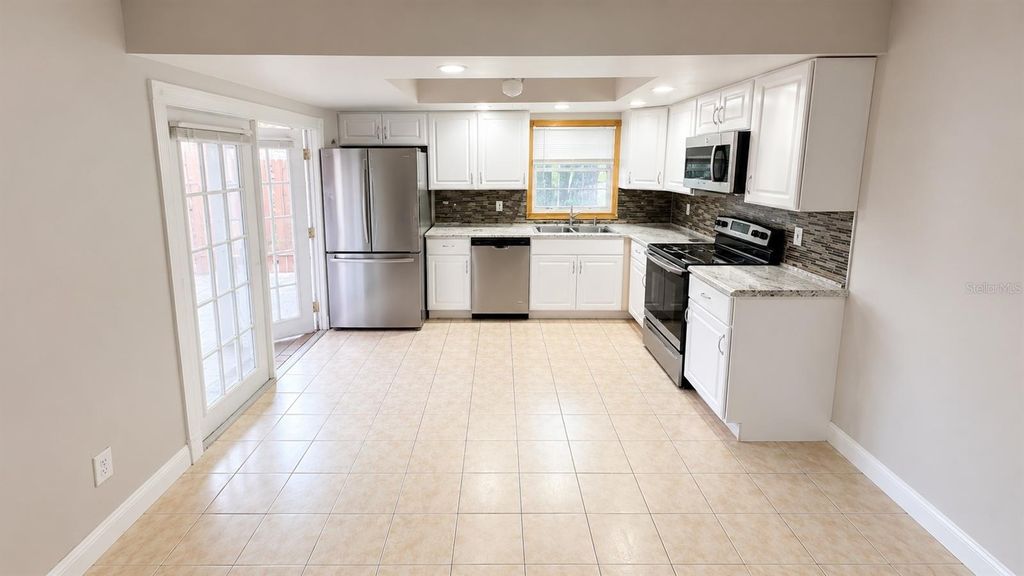 Photo of 120 Moonstone Court, Port Orange, FL 32129 (MLS # TB8532816)