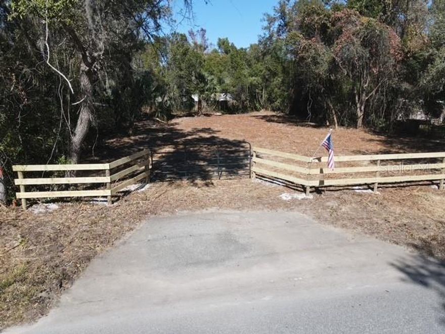 OWNER FINANCING $7500 down the remaining balance amortized over 10 years at 13%. Lot is cleared and has electric nearby. Come see this beautiful setting for your new home. This property is ready for your new home and will accept site-built or manufactured homes.