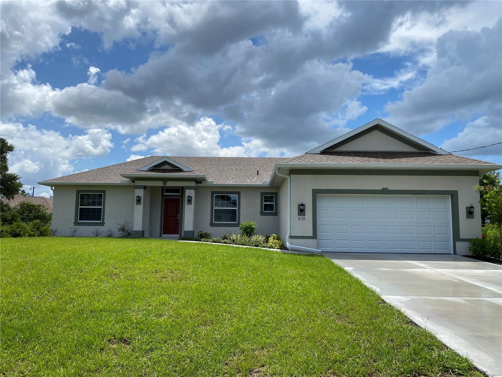 PRICE REDUCED! New construction. Move in ready. Open/split floor plan. Granite Countertops and soft close cabinets and drawers. Kitchen has a breakfast island with plenty of cabinets and counter space. 9'4" ceilings. A laundry room with cabinets and countertop convenient for folding laundry. The home has a combination ceramic tile and carpet. This home features a spacious primary bedroom that is approximately 14x15.