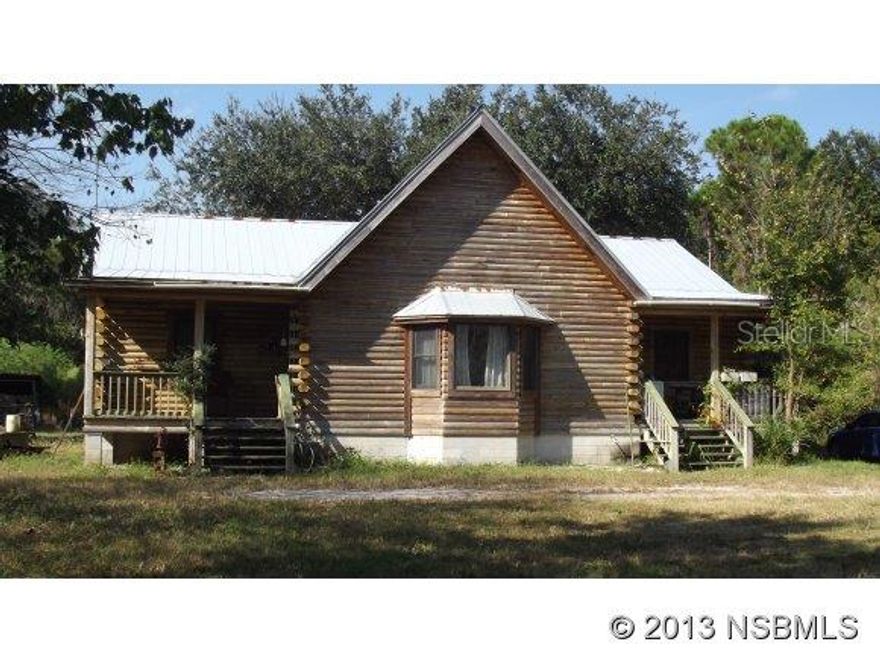 "Contingency with kick out pending sale of buyers property" Beautiful Log home on just over 5 Acres is ready to become your country oasis! The 2 Bedroom / 2 Bath split plan with a loft offset with a nice bay window has over 2000 SF inside. Large beams in the ceiling give dynamic overhead views and a sense of space. The country style kitchen also has access to the jack and jill type bath that also connects to the 2nd bedroom. Property is accessible from both Volco rd and Liza Clinton Rd.