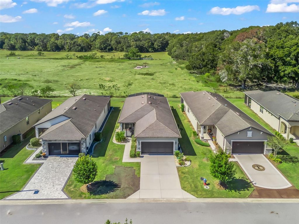 Photo of 9717 SW 63rd Loop, Ocala, FL 34481 (MLS # OM711764)