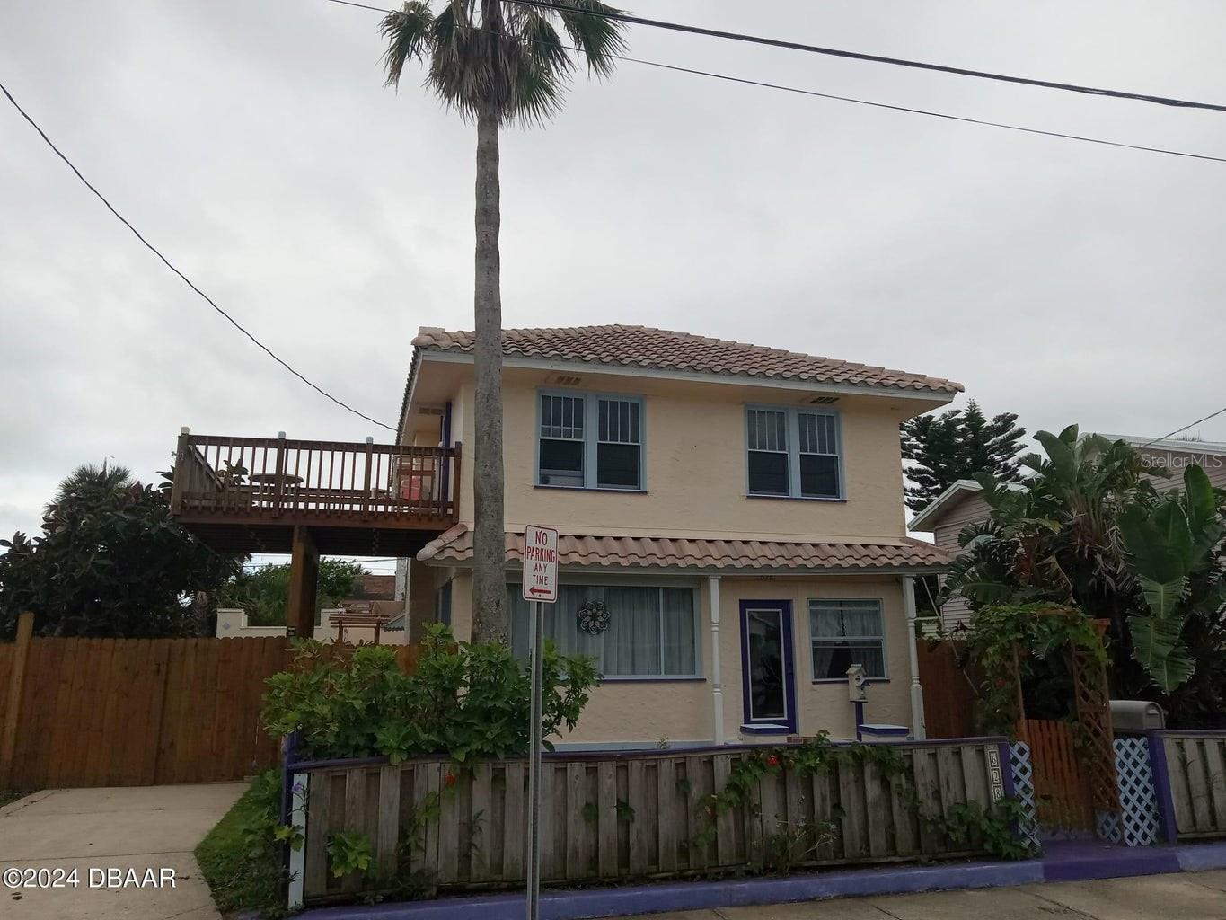 Have you ever dreamed of living at The World's Most Famous Beach? Now is your chance. From the glory of your 3/2 house, you are just steps away from the sugar-sand shoreline of Daytona Beach. This is an excellent walking beach with a level shore and miles of scenic walking to the south or north. To the north is the famous Boardwalk, Ocean Deck Restaurant, and the Main Street Fishing Pier with Joe's Crab Shack sitting atop, all within a mile. Directly across the street is Crabby's Oceanside Restaurant and Jimmy Buffet's Landshark Restaurant and Tiki Bar. The house has beautiful original wood floors throughout, wood baseboards, and wooden doors. The glass doorknobs offer a glance into the past. The two full baths have gorgeous tilework and come complete with towels, wash cloths, and toiletries. The bedrooms are large and the living room and dining room boast high ceilings. Lighted ceiling fans are in every room. The upstairs and downstairs have their own AC units.
Both were serviced in May and June. The upstairs unit had a new coil and condenser installed. The ductwork under the house for the downstairs AC vents was completely replaced in May 2024. The upstairs boasts a 12' x 12' deck off the master bedroom. The view of the ocean from the deck is stunning. The beautiful low maintenance concrete swimming pool offers a cool dip on a summer's day, or after that beach walk. It holds 13,500 gallons and has a new pump, filter, and salt chlorinator so no hauling in heavy bottles of bleach. The full size, detached garage provides room for your vehicle and has a studio in the back with AC and dehumidifier.
There is even a brand new two-person rubber boat with an electric trolling motor and lithium battery that have never been in the water. The house is being sold completely furnished. There are two large flat screen smart TVs along with many DVDs. Appliances include matching Whirlpool washer and dryer, Whirlpool glass top electric range and oven, Samsung side-by-side fridge and freezer, and built-in GE dishwasher. It has a GE microwave, coffee maker, cookware, dishes, utensils, and everything you need to start living the Florida Lifestyle today. Life is short. Enjoy waking up to sunrise at the beach while it is still affordable.