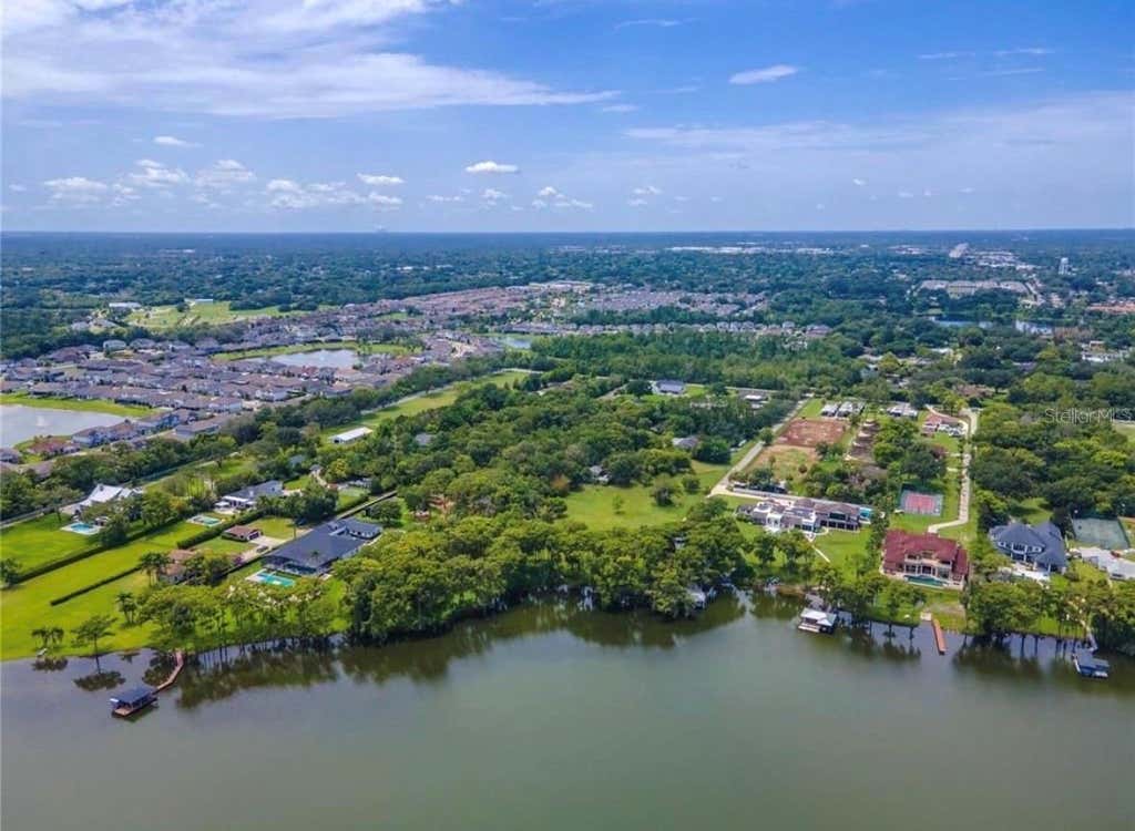 Photo of 1133 Bella Lago Cove, Winter Park, FL 32792 (MLS # O6434781)