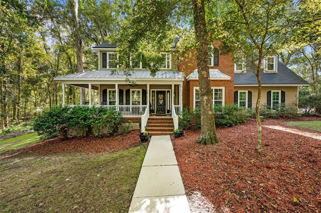 Photo of 5411 NW 91st Boulevard, Gainesville, FL 32653 (MLS # OM734182)