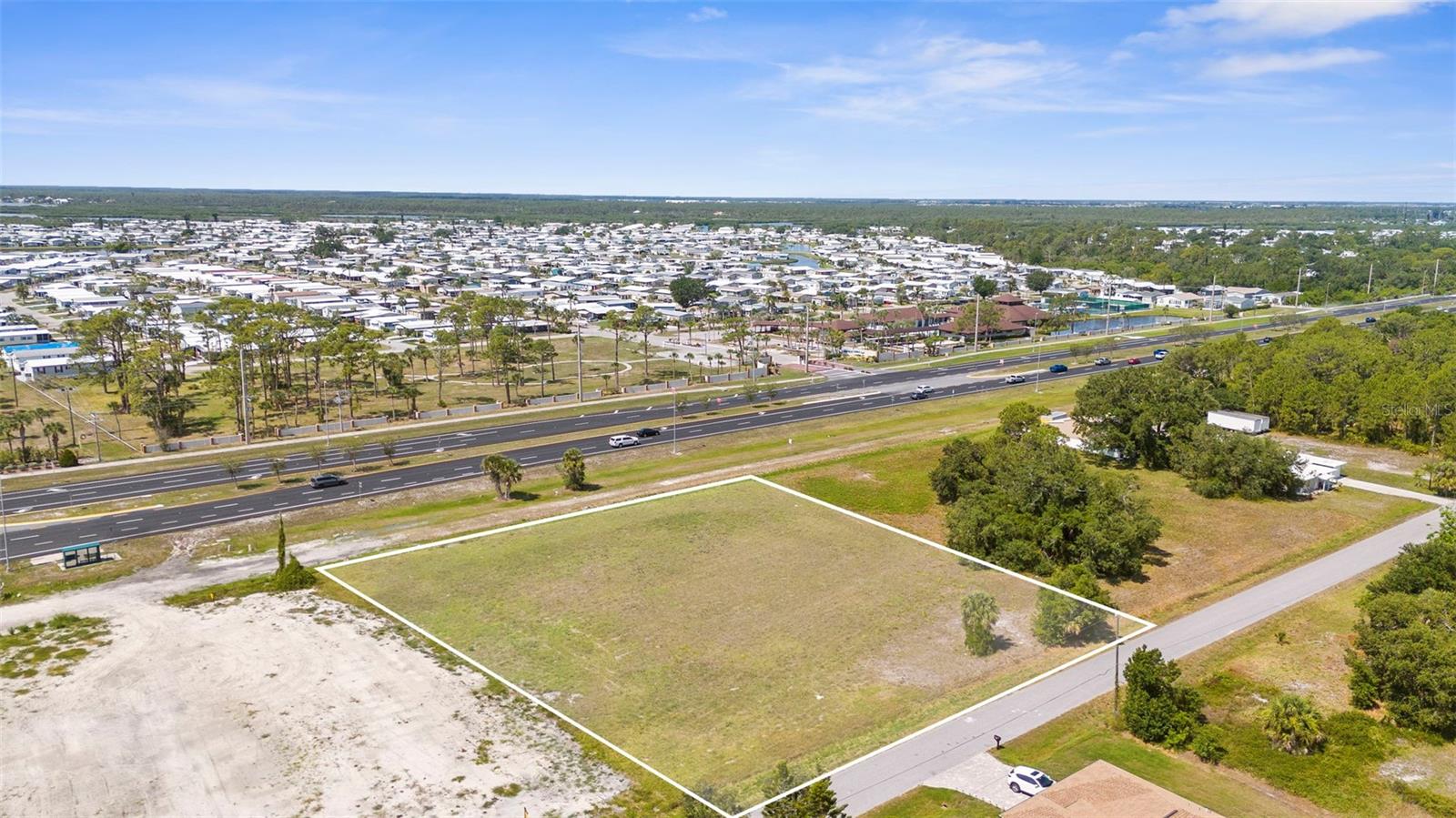 This massive 1.12-acre property stands out as one of the largest residential lots available in the South Venice area providing a rare opportunity to build big or invest smart in a growing Florida market. The property is zoned RMF-3 in the Warm Mineral Springs Unit 82 subdivision and is comprised of lots 3,4&5 and would allow 14 units in total. The RMF-3 zone allows 13 units per acre. This prime corner lot has easy paved access, available utilities, and sits just minutes from Venice Beach, Shamrock Park, and the Legacy Trail. Whether you're looking to develop, hold, or build your dream residence, this is the kind of lot that rarely hits the market.