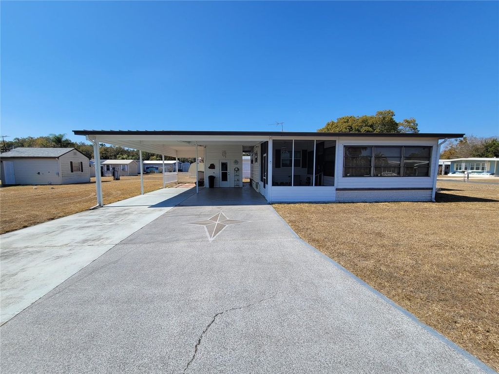 Photo of 39438 Rockford Avenue, Zephyrhills, FL 33542 (MLS # TB8476011)