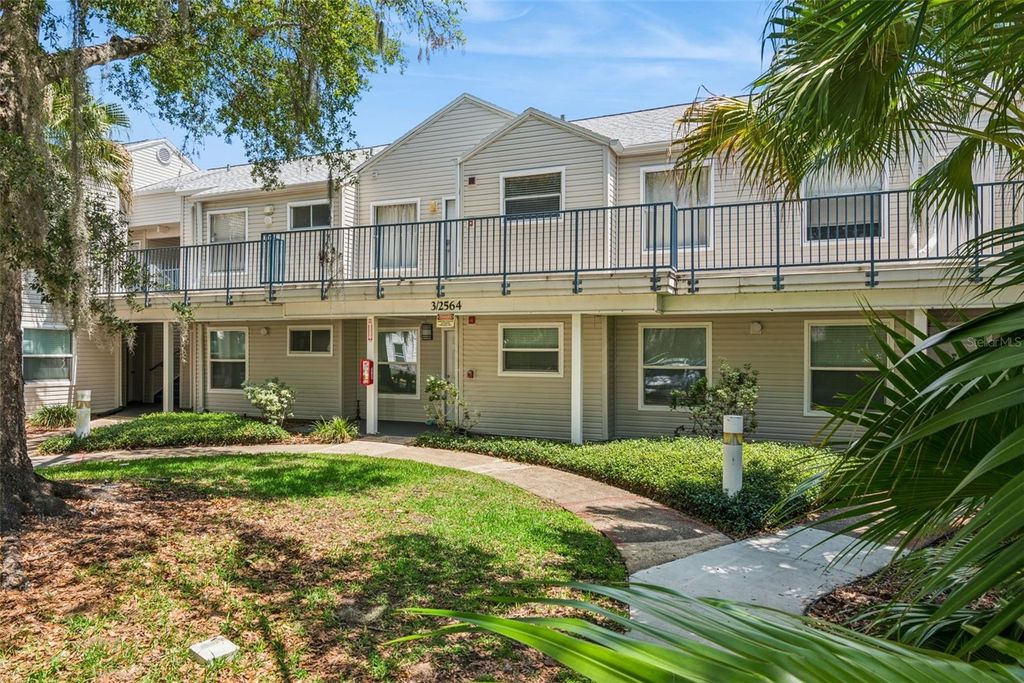 Photo of 2564 Woodgate Boulevard #204, Orlando, FL 32822 (MLS # O6408565)