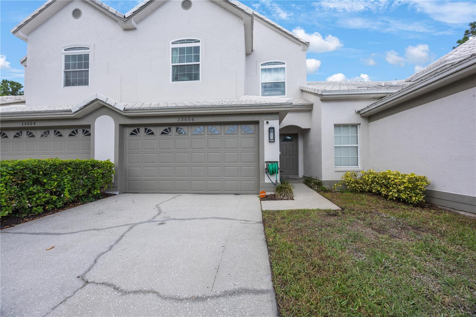 Welcome to the beautiful townhomes of Eagles Walk.This desirable gated community offers a serene neighborhood, lots of privacy and a large swimming pool and spa for residents. It is conveniently located within 15 mins of both Tampa International Airport and St Pete Clearwater Airport, with easy highway access to get to North Pinellas, Tampa, Orlando, St Petersburg, Bradenton and Sarasota. Residents have advantage of being able to stroll or run around the one mile “loop” at Feather Sound, which features a large open green space and state of the art playground, basketball, and nature walk. Living here, you will also have discounted membership to the award-winning Feather Sound Country Club which offers a newly redesigned, par 72, Championship Golf Course, magnificent Tennis Facilities, an inviting clubhouse, and year-round amenities and activities for your entire family just minutes from your home. Walk to the Grocery store, TopGolf, Doctor's Offices, Restaurants, Starbucks and much more! This unique townhome rarely goes up for sale as residents absolutely love it here. This unit sits lakefront, has a nice screened patio out back so you can bask in peace and enjoy nature or use for grilling or entertaining. This gorgeous home also offers countless amenities such as volume ceilings, walk in closets, Powder Room, Bonus Room off the Master Suite, a Flex Space on the first floor plus a two-car garage. Windows and A/C 2024