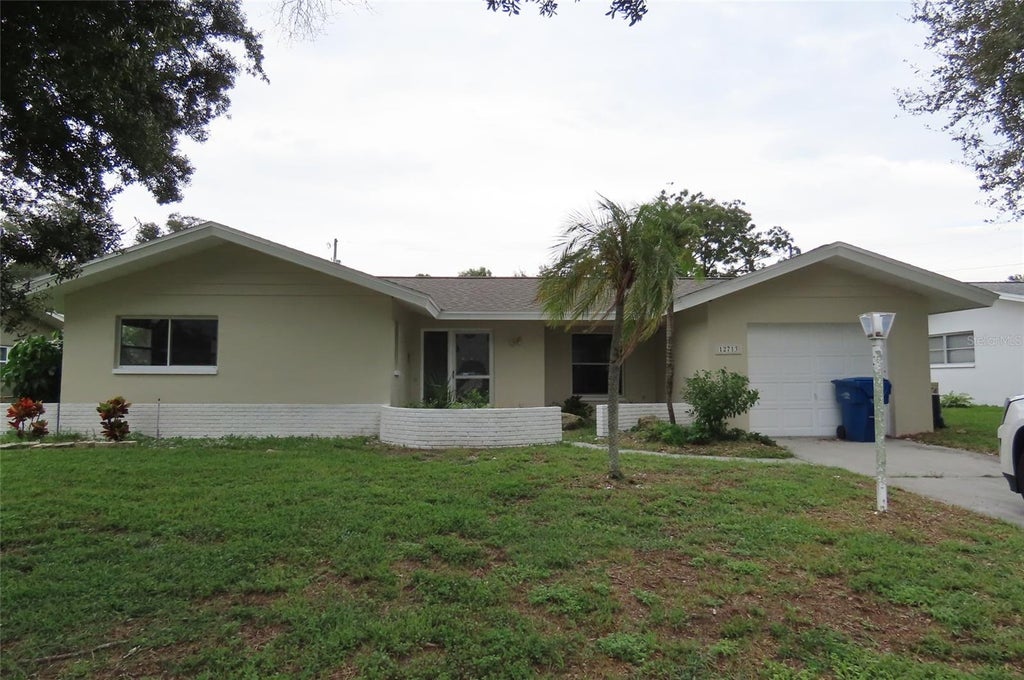 Photo of 12713 137th Lane, Largo, FL 33774 (MLS # TB8556881)
