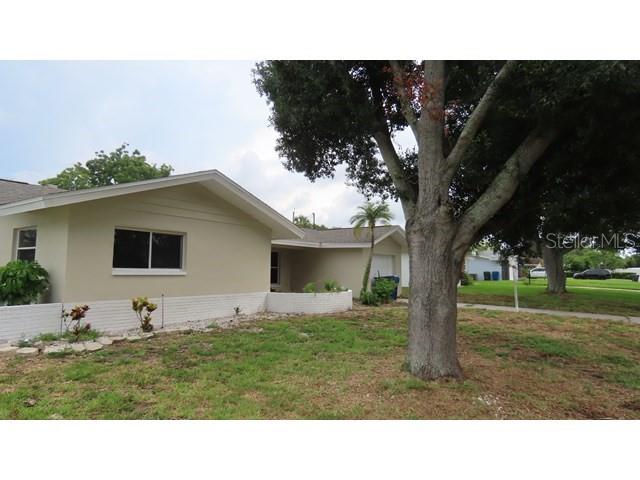 Photo of 12713 137th Lane, Largo, FL 33774 (MLS # TB8556881)