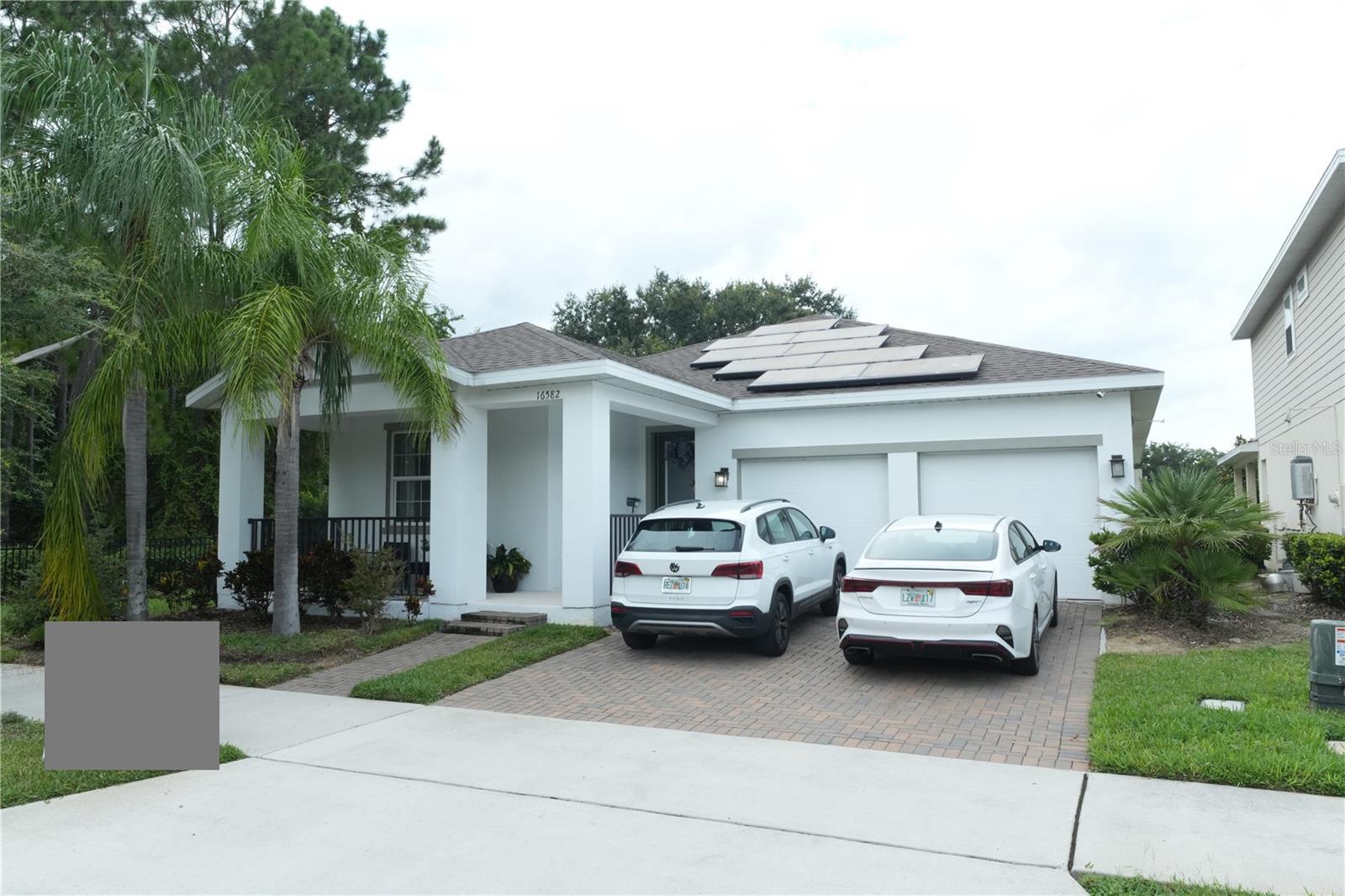 Located in one of the most desirable spots in the community, this home sits on a spacious 7,595 sqft lot with only one direct neighbor. Its position on a quiet interior street (not at the entrance or exit, and not facing the clubhouse or mailboxes) ensures maximum privacy and tranquility.
Inside, enjoy premium upgrades such as a gourmet tower oven set, built-in range hood, Leaf Home water filtration system, Calacatta quartz countertops, and waterproof laminate flooring. The home also features a flex room for added versatility, a designer master suite with LED lighting and a textured accent wall, a custom-built closet, and an epoxy-finished garage.
With Samsung-equipped laundry, energy-saving solar panels, and a prime Winter Garden location near schools, shopping, and Disney, this home delivers the perfect blend of elegance, privacy, and efficiency.
• Large 7,595 sq ft lot—larger than most homes in the community
• Only one direct neighbor, offering extra privacy
• Located on a quiet interior street, not at the main entrance or exit
• Not facing or next to the clubhouse or mailboxes—reduced noise and traffic
• Calacatta quartz countertops in the kitchen
• Gourmet tower ovens and built-in range hood
• Leaf Home water filtration system
• Waterproof laminate flooring throughout the living areas
• Master suite with LED accent wall lighting and custom textured wall
• Designer light fixtures across the home
• Flex room offering versatile space for office, playroom, or gym
• Garage with epoxy-coated floor
• Laundry room with Samsung washer/dryer set and custom cabinetry
• Master walk-in closet with custom built-in structures
• Energy-efficient solar panels included
• Prime Winter Garden location near schools (grade A+), shopping, and Disney