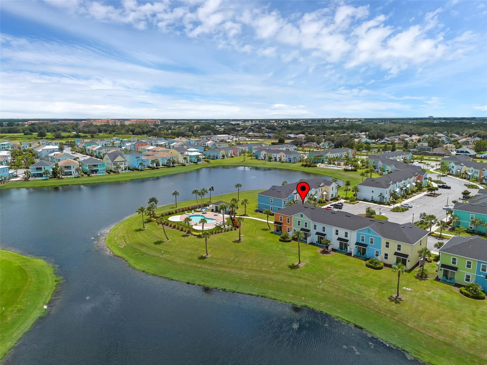 Welcome to your ultimate getaway at 3049 Caribbean Soul Drive! This fully furnished, professionally decorated 4-bedroom, 3-bathroom townhome is the epitome of island living. As an end unit, you'll enjoy extra privacy and an abundance of natural light. Step outside and take in the serene water views, or simply walk a few steps to one of the community's beautiful pools. This property is perfect as a vacation home or an investment property, with its vibrant, Key West-style architecture and turnkey setup, complete with all the furniture, art, and decor you need to start enjoying the laid-back lifestyle immediately.
Situated within the Margaritaville Orlando Resort, this townhome offers a lifestyle of luxury and convenience. Residents and guests have access to an impressive array of amenities, including multiple resort-style pools with a lazy river and water slide, the St. Somewhere Spa, a 24-hour fitness center, and a variety of on-site restaurants and bars like Euphoria Fish House and the Salty Rim Bar & Grill. The resort also features the Promenade at Sunset Walk, a vibrant destination for shopping, dining, and entertainment, and provides a complimentary shuttle service to Walt Disney World theme parks. This prime location places you close to Central Florida's world-famous attractions, premier dining, and top-tier shopping, making it a perfect retreat for both relaxation and adventure.