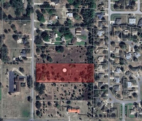 Discover this beautiful 2.85+/- acre parcel that offers the perfect blend of privacy and possibility. Whether you're dreaming of building your forever home or a weekend retreat this estate-sized residential lot sets the stage. Just a quick drive from both the lively charm of The Villages and the endless adventure of Orlando, the location balances seclusion with convenience. Outdoor lovers will appreciate being just minutes from the waters of Lake Harris and the expansive Harris Chain of Lakes which is a chain of seven lakes that total approximately 76,000+/- acres of water. With new growth quietly reshaping the area, now’s the time to plant your roots.
All information is believed accurate and correct but not guaranteed or warranted and subject to change without notice.
