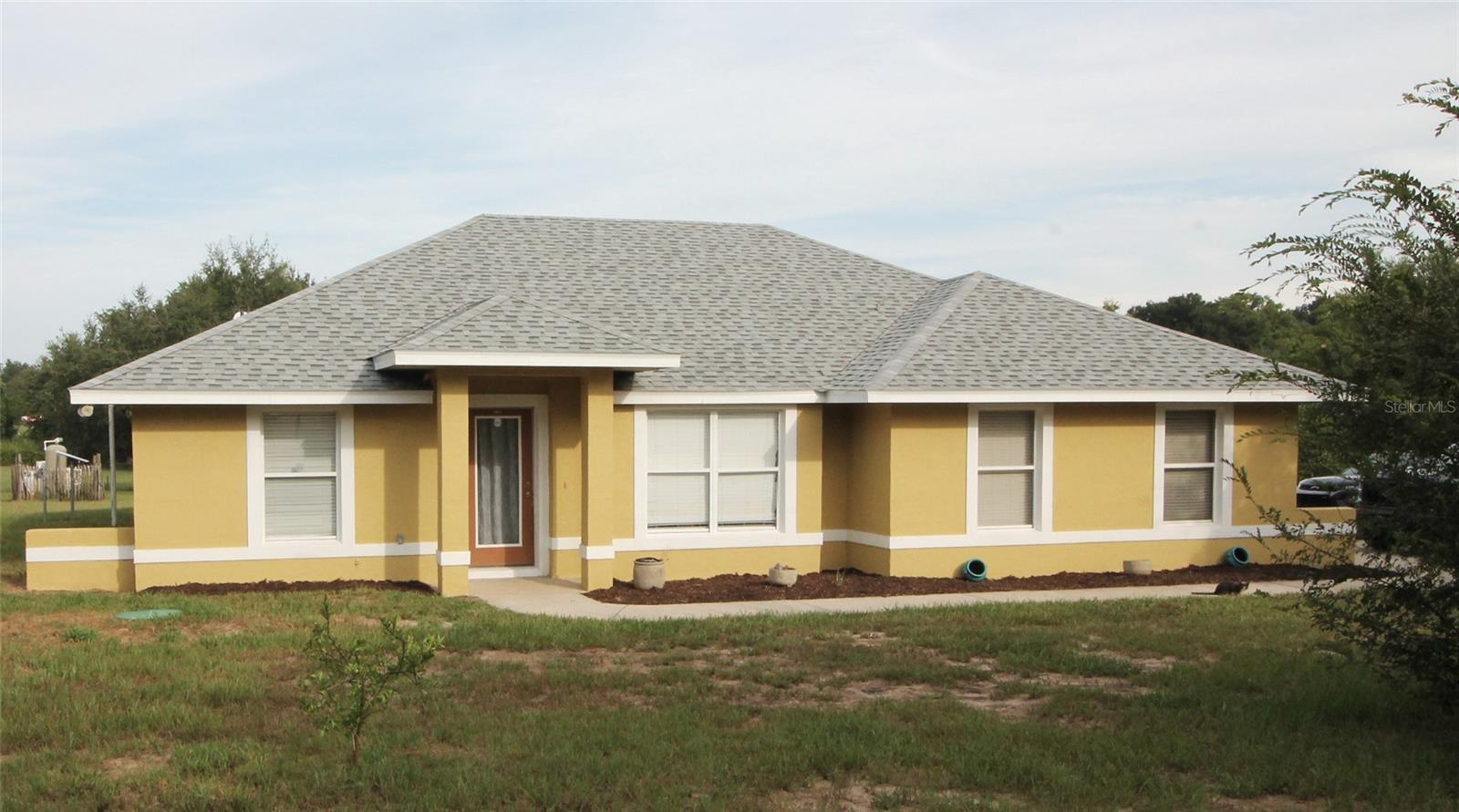 Country Comfort Meets Future Opportunity – 3.25 Acres, Pool, No HOA & No Water Bill!
Peaceful Country Living on 3.25 Acres – No HOA!
Enjoy wide-open space and privacy in this well-maintained 3 bedroom, 2 bath home set on 3.25 fully fenced acres along quiet Smith Rd, just 2 miles north of State Road 50—Central Florida’s main east-west corridor.
Highlights include a 31’ x 13’ swimming pool under an expansive 37’ x 19’ screen enclosure, a side-entry garage for great curb appeal and convenience, and a brand-new roof installed in 2024. Inside, Bedroom 3 features a second door at the foyer, making it ideal for a home office, guest suite, or flex space.
The home is served by a private well, so you'll enjoy no water bill, along with a recently installed Culligan water treatment system. Additional updates include an updated A/C and an updated septic tank and drain field, offering peace of mind for years to come. A custom 36’ x 12’ pole barn provides extra space for equipment, animals, or hobbies.
Surrounded by citrus groves, cattle operations, and 5-acre ranchettes, the area retains a rural charm while benefiting from future land use designating it for extensive single-family development.
Whether you're looking for a personal retreat, a mini-homestead, or a smart investment—this property delivers.
No HOA. No water bill. Room to roam. Real potential.