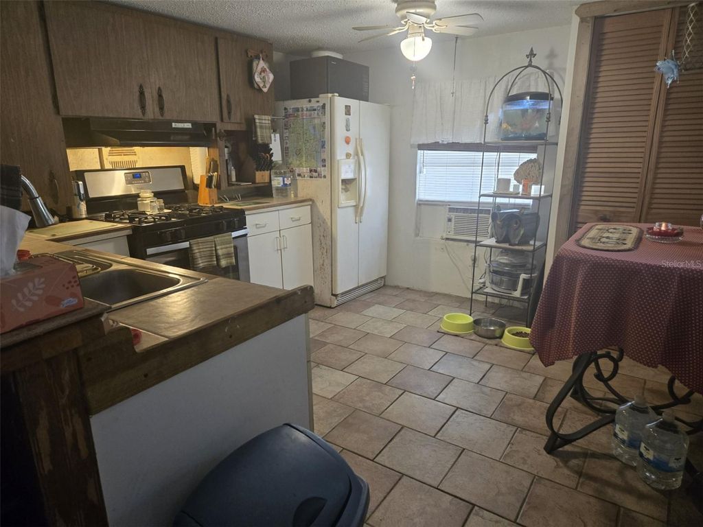 Photo of 120 West Loop, Oak Hill, FL 32759 (MLS # NS1088169)