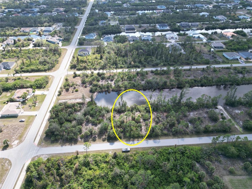 Photo of 15205 Amsterdam Avenue, Port Charlotte, FL 33981 (MLS # D6140556)