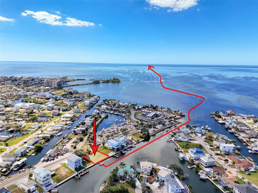 One or more photo(s) has been virtually staged. This WATERFRONT DOUBLE LOT is located in the desirable HUDSON BEACH ESTATES SUBDIVISION. It features an 80ft CONCRETE SEAWALL and a New 8 x 16ft. FLOATING DOCK The WATER and SEWER are connected. The ELECTRIC is at the pole. THE MOBILE HOME WILL BE REMOVED BEFORE CLOSING! The location is perfect if you enjoy walking to the BEACH to watch the AMAZING SUNSETS every night or catching a bite to eat at one of your preferred restaurants like INN ON THE GULF, SAM'S BEACH BAR or OLLIE’S ON THE BEACH which are all a few minutes away. SUNWEST PARK is a LOCAL ATTRACTION that is nearby as well. The HCA FLORIDA BAYONET POINT  HOSPITAL, many local SUPERMARKETS and the PORT HUDSON MARINA  are all located right here in HUDSON, Florida. The TAMPA BAY AIRPORT, TAMPA BAY, CLEARWATER BEACH, HOMOSASSA SPRINGS, TARPON SPRINGS, PINE ISLAND, HONEYMOON ISLAND and WEEKI WACHEE are under an hour away. Build your DREAM HOME, FISH & CRAB off your own dock or take a KAYAK, JET SKI or BOAT RIDE to the OPEN GULF where the FISH ARE PLENTIFUL,  the FUN is NEVER ENDING and the SUNSETS are ALWAYS AWESOME!