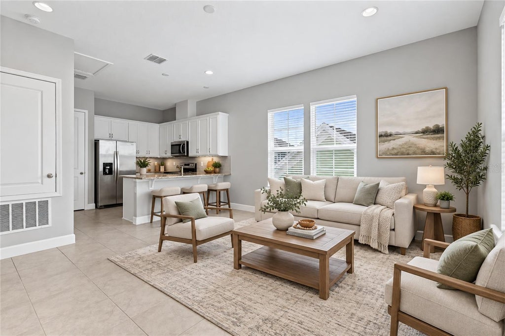 Photo of 13825 Lippman Alley #B, Orlando, FL 32827 (MLS # O6439452)