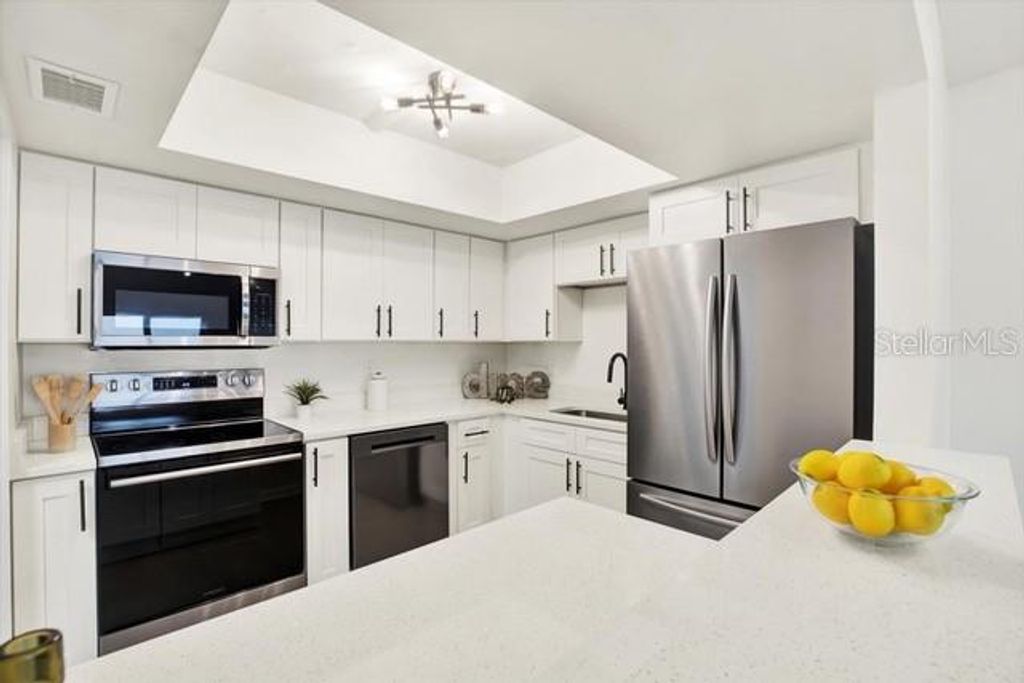 Photo of 5220 Brittany Drive S #106, St Petersburg, FL 33715 (MLS # TB8479524)