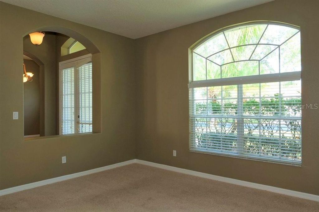 Photo of 4906 E Lake Cove Boulevard, Saint Cloud, FL 34771 (MLS # O6370048)