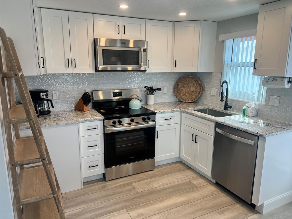 Photo of 6154 Midnight Pass Road #D02, Sarasota, FL 34242 (MLS # TB8468616)