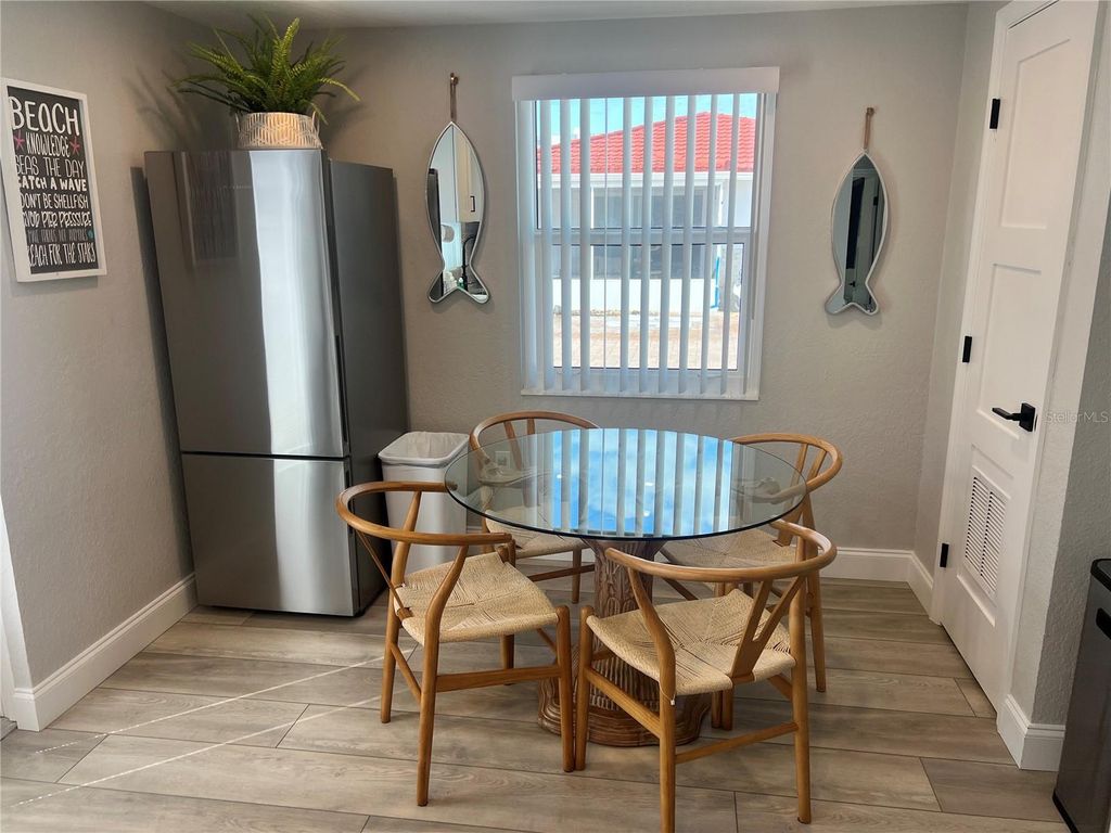 Photo of 6154 Midnight Pass Road #D02, Sarasota, FL 34242 (MLS # TB8468616)