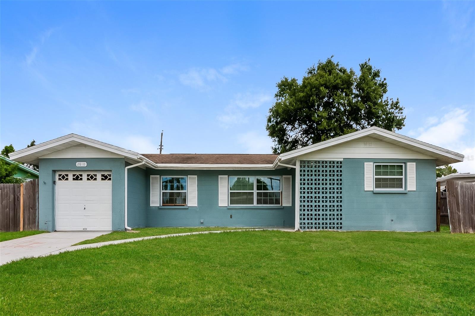 Charm and curb appeal abound for this Bradenton home! Step inside into the inviting foyer and into the well-appointed living room, which is positioned at the center of the home. The kitchen features stainless steel appliances, hard surface countertops, and ample storage. Rounding out this ranch style floorplan is the primary suite, two secondary bedrooms, and a laundry room. Come and see for yourself the possibilities that this home has to offer!