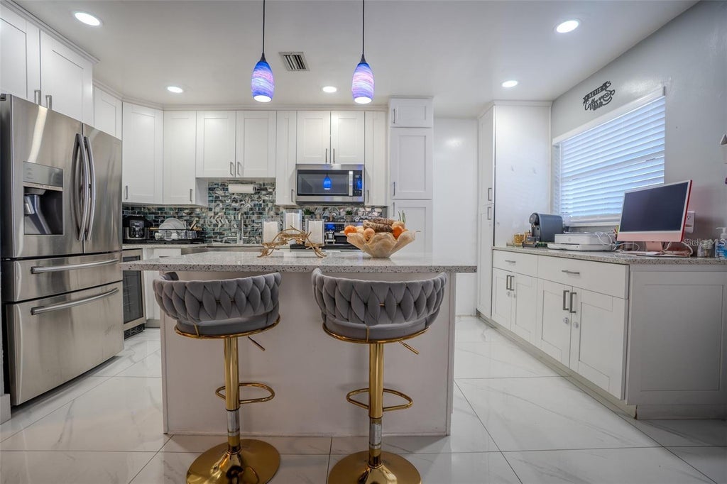 Photo of 6480 34th Terrace N, St Petersburg, FL 33710 (MLS # TB8559370)