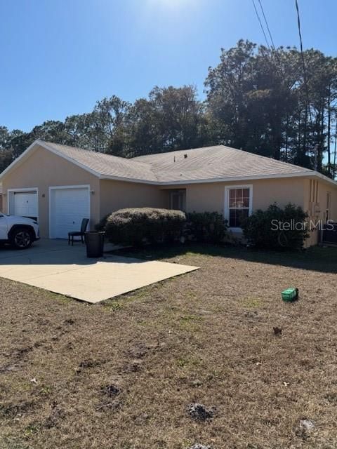 Photo of 60 Plain View Drive, Palm Coast, FL 32164 (MLS # FC315708)