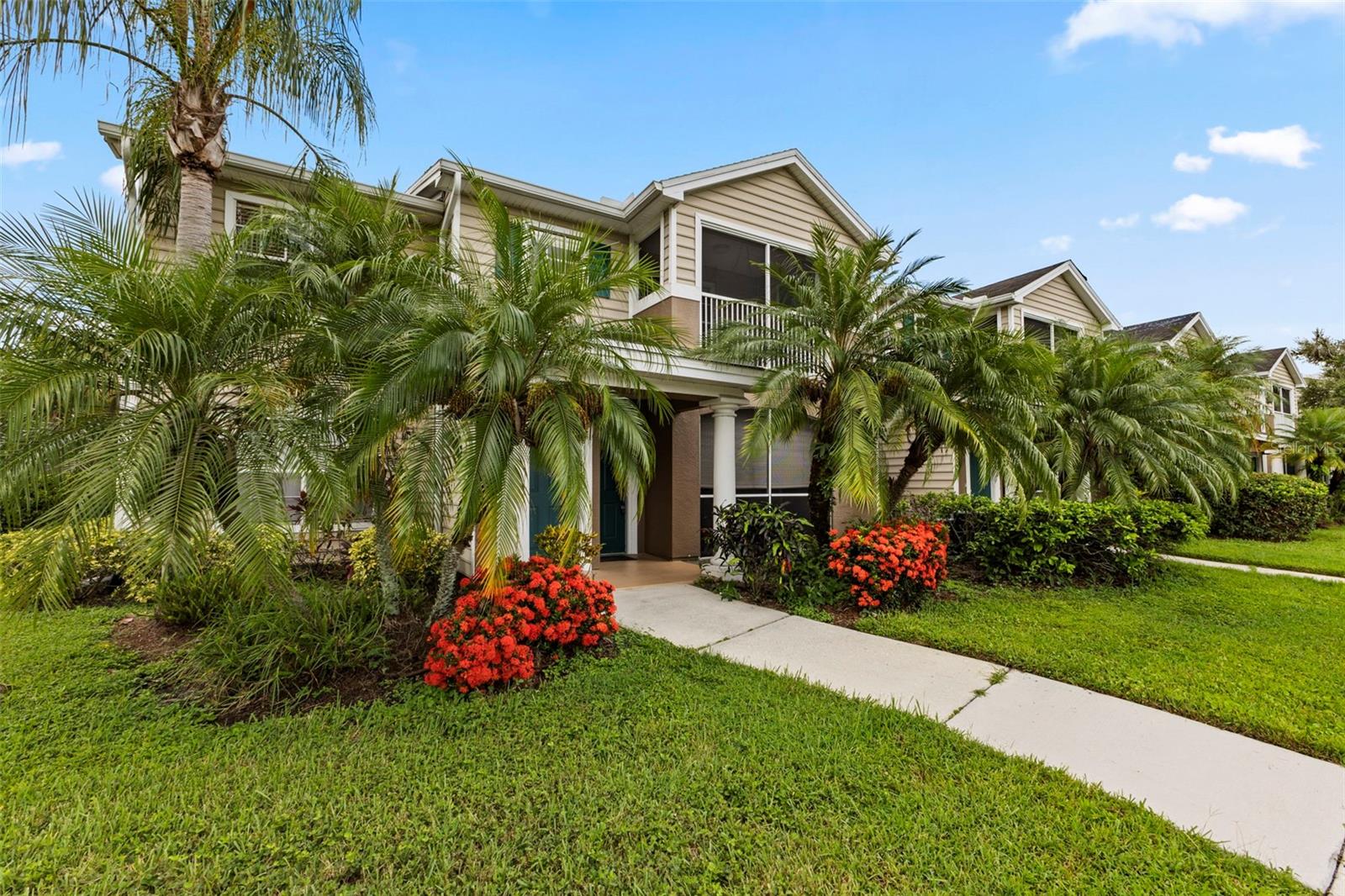 This stunning 2nd floor, 2 bed, 2 bath condo, with its own separately deeded garage, is a must see! Offering all the benefits of the much sought after Lakewood Ranch lifestyle, with a LOW HOA & NO CDD. The vaulted ceiling in the living room adds to the feeling of space in this bright & sunny end unit. The beautiful dark wood, ceiling height, kitchen cabinetry are finished with soft close doors, dovetail drawers and crown molding. The split plan layout ensures privacy and gives a spacious feel to this welcoming home. Both generously portioned bedrooms have their own walk in closets. The unit boasts a NEW A/C unit(2025), dishwasher(2025) & washer(2024). The south facing balcony has a beautiful water view, perfect for relaxing & capturing sunsets. This beautiful community is a peaceful oasis in the heart of Lakewood Ranch. Furniture is negotiable. Only 5 mins from Lakewood Ranch Main St, 10 mins to UTC Mall, 8 mins to the I75, you have everything you could need on your doorstep!