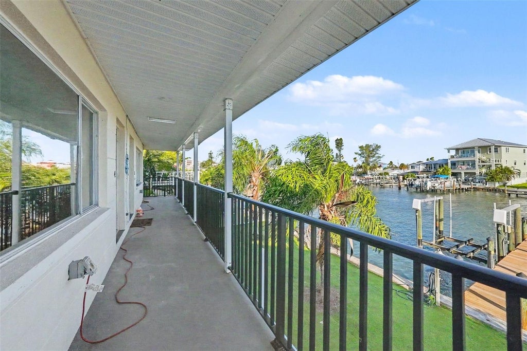 Photo of 515 129th Avenue E, Madeira Beach, FL 33708 (MLS # TB8549377)