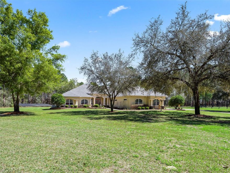 Trail or bike ride to State Forest land from this majestic turn-key 40 acre horse farm w/ 100% custom-built 3 bed+ office/bonus room & 3 1/2 bath pool home! This expansive acreage includes a concrete block construction home w/ pool & oversized 3-car garage, 4+ stall metal barn, huge equipment storage barn, arena, paddocks & trail system. Quiet country setting adjacent to Goethe State Forest but close to Williston & Ocala & Black Prong Resort w/ high-end restaurant is only 2 miles away. The many high-end features of this custom home include gourmet kitchen w/ double granite islands, double ovens, high-end stainless appliances, & soft close cabinets; large screened-in pool deck w/outdoor kitchen, travertine decking, 60’ pool lap lane, tanning ledge & fire pit; large primary suite w/ huge wall-in closet, tray ceiling, 5-piece ensuite bath & attached bonus room; elevated 10’ ceilings, 8’ doors & crown molding throughout; whole house gas generator, 1000 gal in-ground propane tank & tumbled marble & wood flooring. The horse barn features 4, 12’ x 12’ stalls w/ room for more, oversized tack room, large hay storage & grooming area. The large paddocks have been seeded with Tifton grass & the sand arena is 100’ x 130’. The huge metal equipment storage barn is 50’ x 75’, insulated w/ 14’ x 16’ roll-up entry door, has water, 200 amp service w/ 50 amp hook up & 3, 30 amp hook ups. The property features approx. 1+ miles of internal trails for walking, ATV, motocross, or equestrian use. Please see the Property Features list for the many more upgrades & features this truly unique property has to offer.
