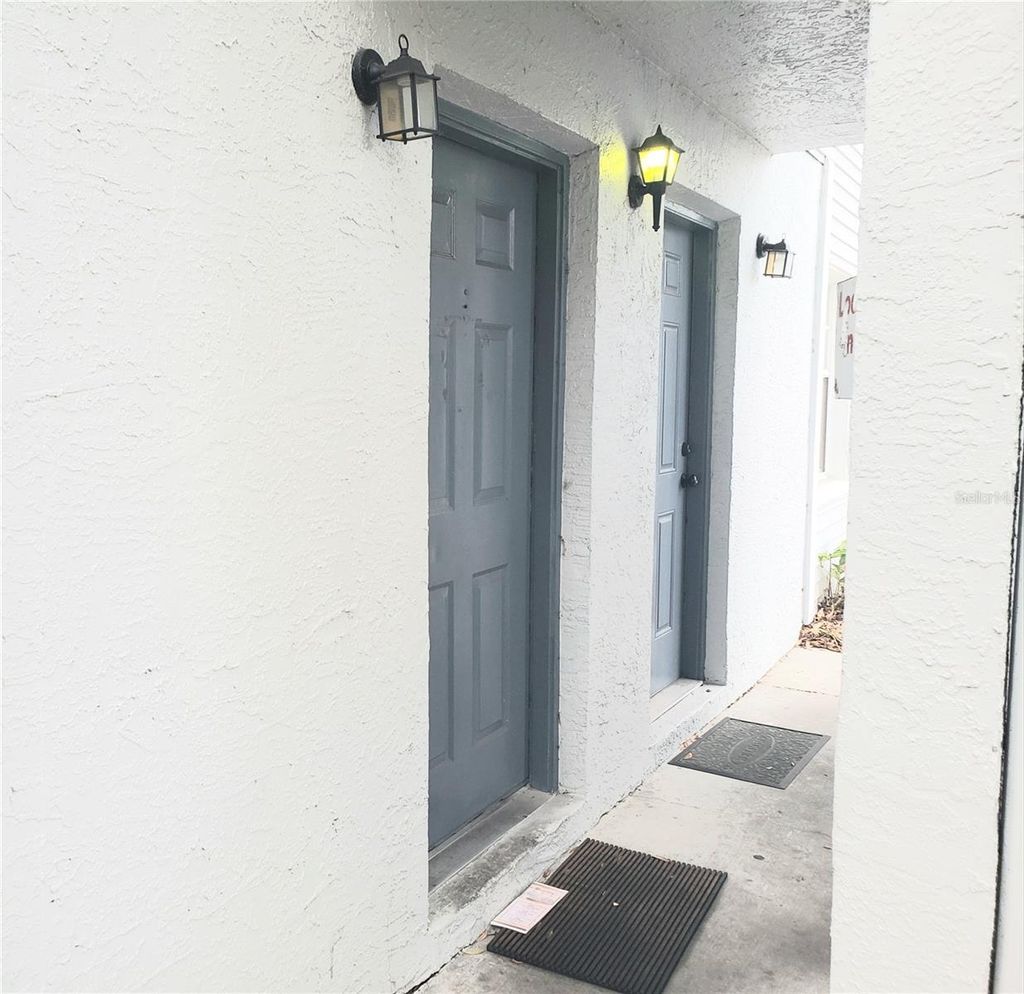 Photo of 7100 Waterside Drive, Tampa, FL 33617 (MLS # TB8456776)