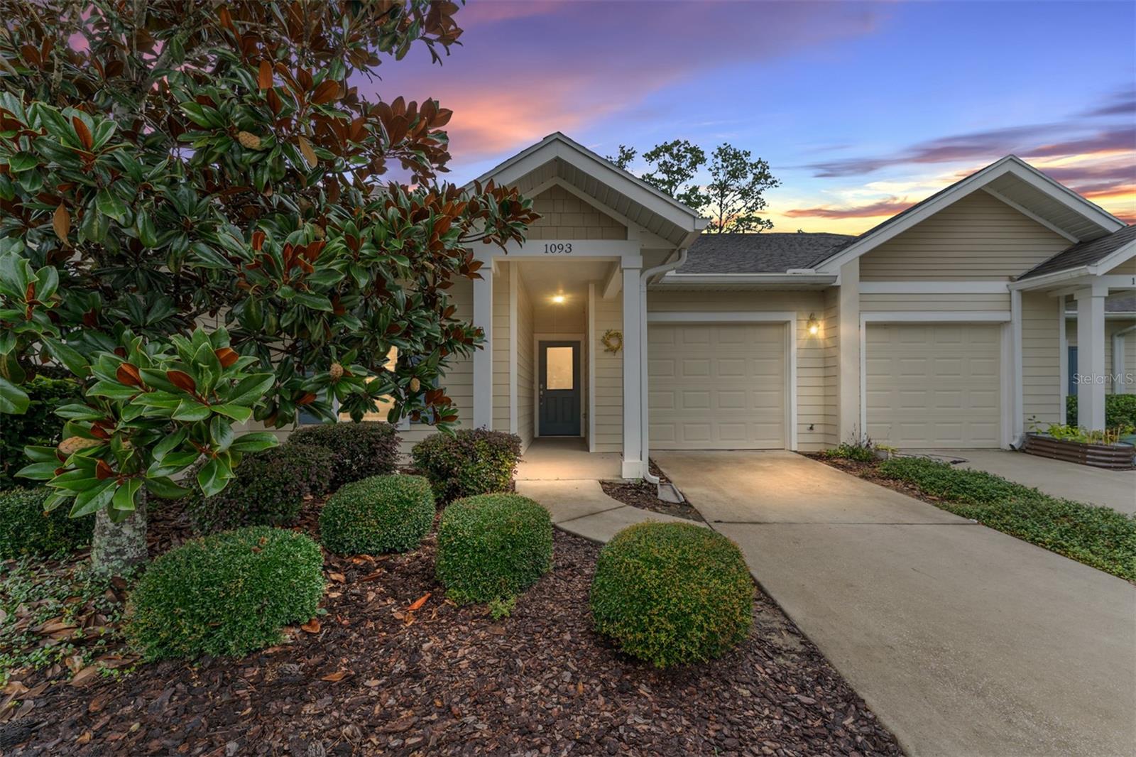 Welcome to the Villas of West End! Built in 2017, this beautifully maintained 2-bedroom, 2-bathroom villa with a versatile flex space offers the perfect blend of comfort, style, and convenience. Step into a bright and airy great room filled with natural light, vaulted ceilings, skylights, and brand-new luxury vinyl plank flooring that flows seamlessly throughout the main living areas. The thoughtfully designed kitchen is both elegant and functional, featuring rich wood cabinetry with crown molding, granite countertops, stainless steel appliances, under-cabinet lighting, pot drawers, a pantry, and a spacious breakfast bar, ideal for both everyday living and entertaining. The spacious primary suite is a true retreat, complete with a large walk-in closet and a private bath featuring a walk-in shower with a built-in bench. A well-appointed second bedroom and full guest bath provide comfort and privacy for visitors. Glass doors lead from the great room to a serene screened porch overlooking private landscaping with no direct rear neighbors, offering a peaceful space to relax. The flex room adds exceptional versatility and can be used as a dedicated home office, hobby room, or even a quiet reading nook, tailored to fit your lifestyle. Additional features include a laundry room and a one-car garage with wall-mounted shelving. Enjoy low-maintenance living with access to community amenities including two pools, tennis and pickleball courts, and a clubhouse. Located just minutes from shopping, dining, entertainment, and local hospitals this villa offers the best of Florida living. Schedule your private showing today!