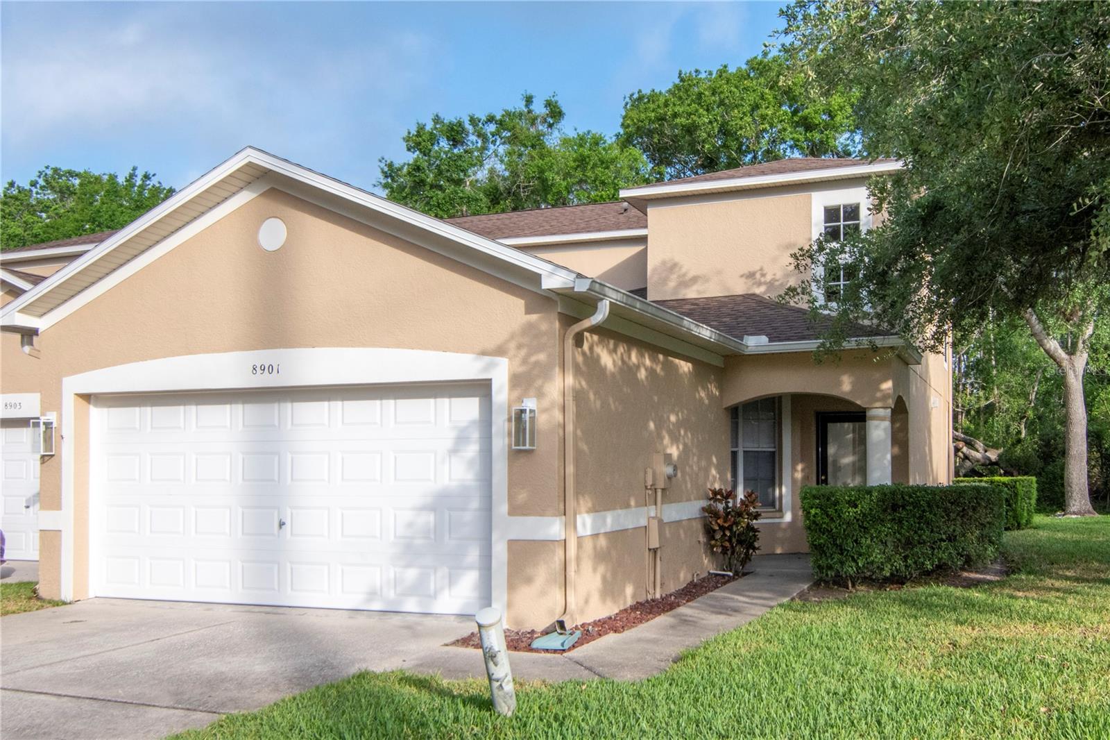 SELLER IS WILLING TO ASSIST WITH SOME BUYER CLOSING COSTS!! Discover your ideal home in this meticulously maintained townhouse at Casablanca in Westchase/Citrus Park. Approximately 1,597 square feet of thoughtfully designed living space awaits in this 3 bedroom, 3 bathroom and 2 car garage. Located within a well-maintained community, residents can enjoy the convenience of a shared pool and the inclusion of water, sewer, and garbage collection services.
Step inside to soaring two-story ceilings and a spacious kitchen, flowing into a living area that opens to a serene private preserve view creating a warm and inviting atmosphere. The primary master suite downstairs features a walk-in closet and en-suite bath with shower. Upstairs, find two additional bedrooms that provide versatile spaces, ideal for guest accommodations, personal gym or a home office and a full bathroom. Easy move-in with optional furnishings. Casablanca's community pool and the convenience of a top-rated school district, with abundant shopping and dining nearby. Recent upgrades include a 2023 roof and exterior paint, and a newer A/C 2024. The HOA fee covers roof reserve, pest control, trash, water, pool, and exterior maintenance. Ideally located, you're just 15 minutes from Tampa International Airport, under 5 minutes from the Veteran Expressway, and close to I-275, I-4, and downtown Tampa. Explore diverse financing options, including little to no money down, and let us help you call this house your home!