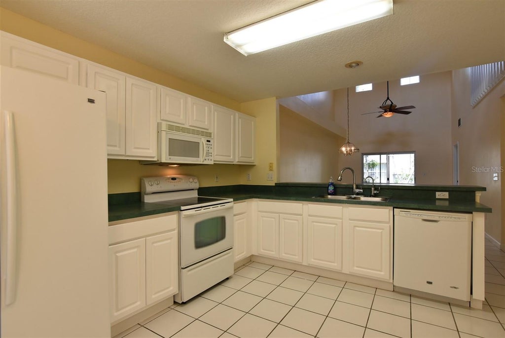 Photo of 2203 Cypress Knee Loop, Kissimmee, FL 34743 (MLS # O6421602)