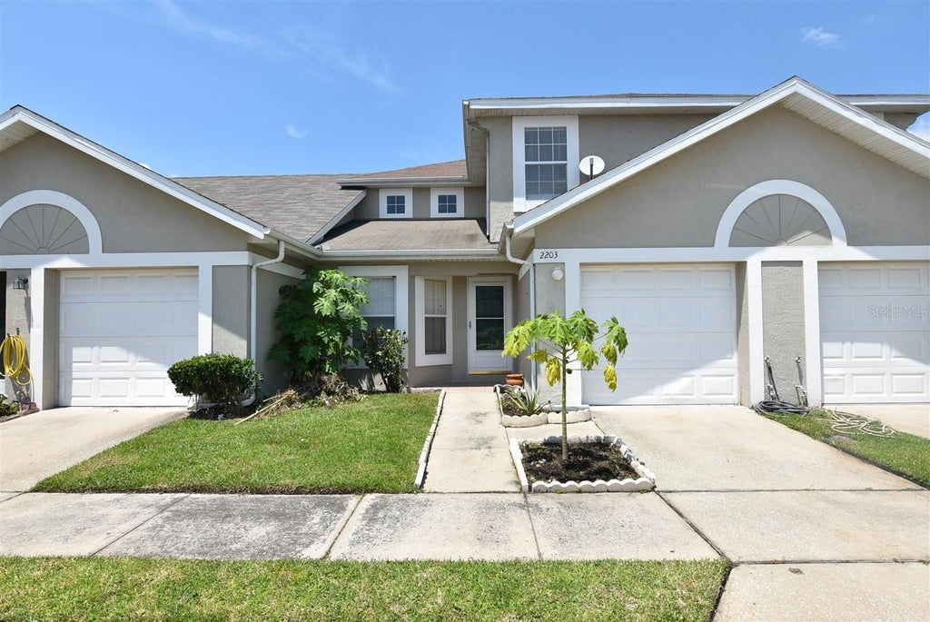 Photo of 2203 Cypress Knee Loop, Kissimmee, FL 34743 (MLS # O6421602)