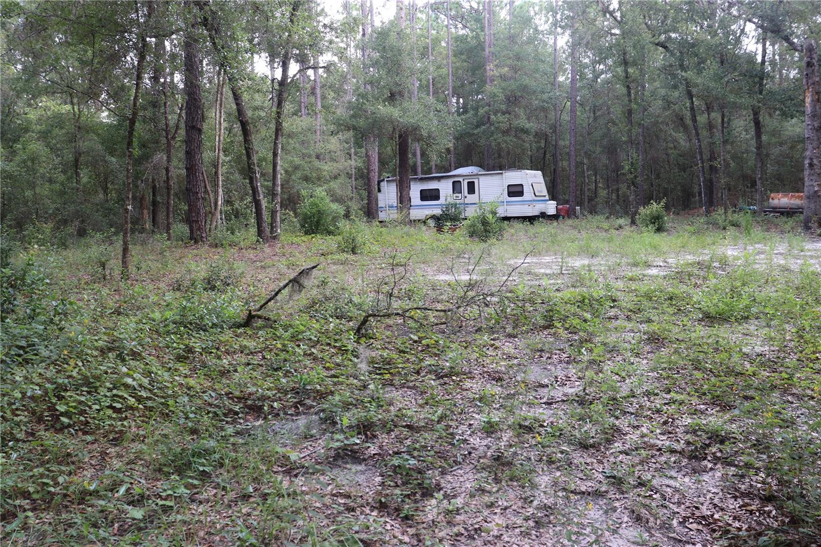 Quit cleared off gride lot keeping you close to the river and gulf without worries about flood. Great starter investment for your future home.