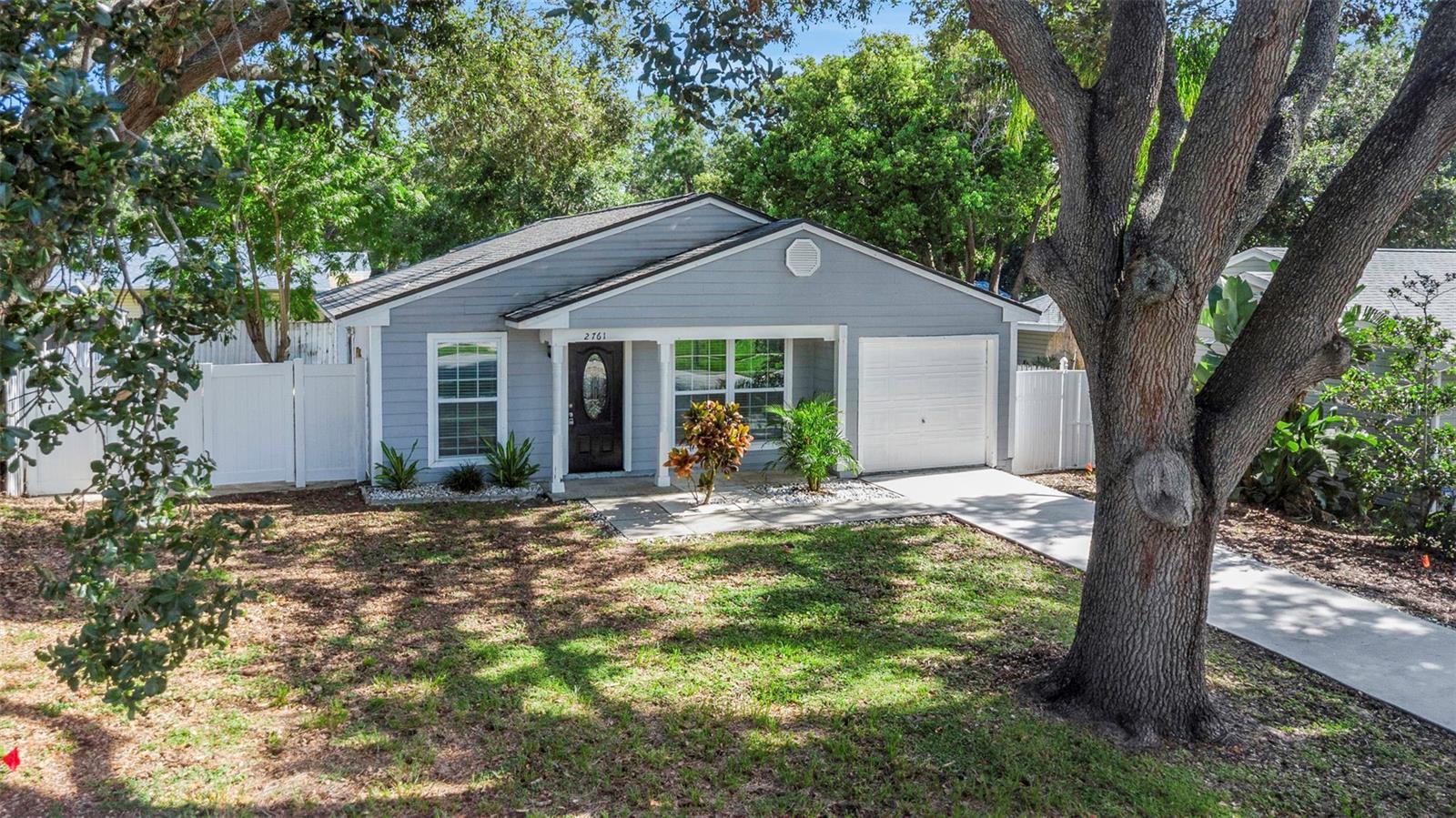 Beautifully Renovated 3 Bedroom, 2 Bath, 1 Car Garage Home Nestled on a Cul-De-Sac Lot. This Open Concept Floor Plan with Eat-In Kitchen, Granite Counter Tops, Rich Wood Cabinets. Wood-Like Flooring throughout. Master Bedroom with Private Bath features Step-In Shower with Vanity & Fixtures. Second Bath adjacent to Two Bedrooms with Tub & Tile, Vanity & Fixtures. Shows Light and Bright. Cozy Covered Front Porch- Great for your Morning Coffee. Community offers Pool, Tennis Courts and Playground. Great Location with easy access to County Parks, Beaches, Shopping, Dining and all the Amenities the Florida Lifestyle has to offer.