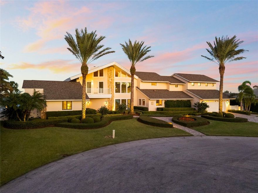 Don’t miss out on this incredibly rare opportunity to purchase this immaculate Coastal Contemporary Home on Yacht Club Island in New Smyrna Beach! Located in the gated, enclave community of Yacht Club Island with 140ft of Deep Water, Intracoastal Waterfrontage allowing larger yachts that is a rare find in the New Smyrna Beach area. Entering the home, you’re greeted by the expansive open floor plan with soaring vaulted ceiling and floor to ceiling windows along the rear of the home showcasing the stunning intracoastal and conservation views. The chef's kitchen is designed for culinary excellence, featuring Wolf stainless and gas appliances, large wine fridge, an expansive island with separate bar top, perfect for entertaining. A floor to ceiling stone fireplace highlights the combined great room, living room and dining room. Sliding glass doors lead to the backyard oasis, complete with a resort-style pool, spa, oversized sun shelf, and a detached 12’x17’ covered lanai, perfect for outdoor relaxation and gatherings. The stunning owner’s suite offers panoramic views of the intracoastal, including a large seating area, walk-in closet and beautiful bath featuring a free-standing tub, walk-in shower all accented by custom woodwork offering a true spa-like experience. The home also features a concrete bulkhead sea wall, covered dock w/ metal roof and a remarkable outdoor lighting and landscape package that is truly impressive. Located a short golf cart ride to the Canal St District and Flagler Ave with all the sought-after restaurants, shopping and entertainment that New Smyrna Beach has to offer. Don’t miss this rare opportunity!