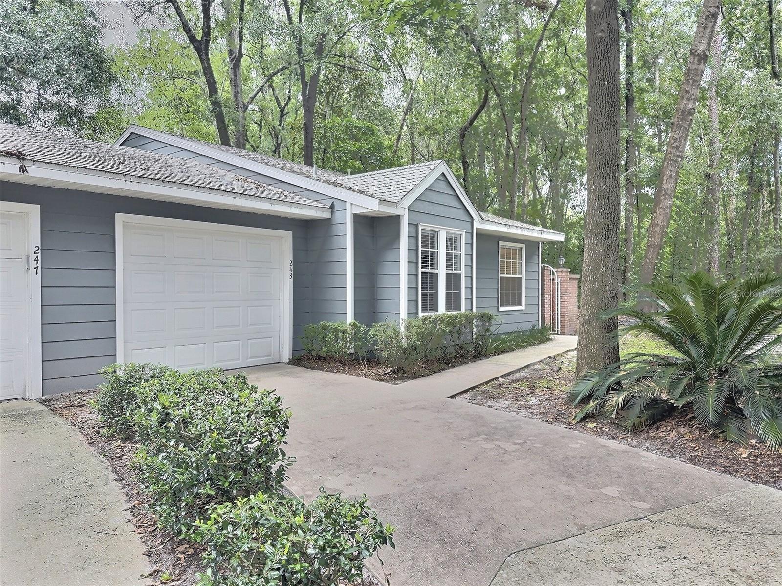 Welcome to this beautifully maintained one-story condo offering the perfect blend of comfort and convenience. This 2-bedroom, 2-bathroom home features stylish granite countertops in both the kitchen and bathrooms, adding a touch of luxury throughout. The kitchen features a counter height bar, giving the kitchen an open feel. The master bath includes dual sinks and tub. The master closet is a large walk-in closet with plenty of space. The second bedroom is perfect for guests, a home office, or hobbies. Unlike many condos, this one has an attached one-car garage and a driveway. Enjoy stress-free living with an HOA that covers exterior maintenance, roof upkeep, and regular pressure washing. This property is in prime location, directly across from Gainesville Health & Fitness and a short drive from The Oaks Mall, HCA North Florida Hospital, and less than 10 min from UF! Whether you're a first-time buyer, downsizing, or looking for a turnkey investment, this move-in ready condo checks all the boxes. Schedule your private tour today!